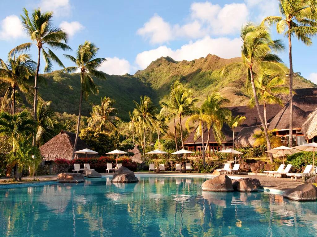 Tropical resort with pool and mountain view